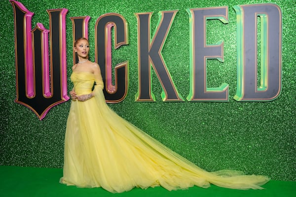 Ariana Grande poses for photographers upon arrival at the premiere of the film 'Wicked' on Monday, Nov. 18, 2024, in London. (Photo by Scott A Garfitt/Invision/AP)