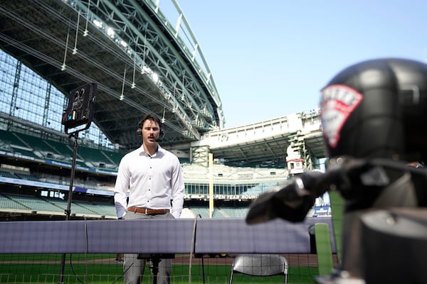 FILE - Pittsburgh Pirates pitcher Paul Skenes is interviewed by MLB following a win over the Milwaukee Brewers in a baseball game, Thursday, July 11, 2024, in Milwaukee. (AP Photo/Kayla Wolf, File)