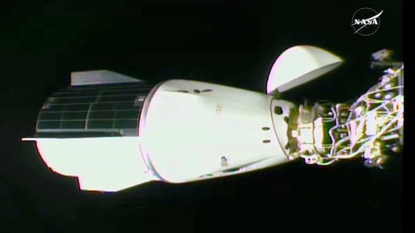 This image made from video by NASA shows the docking of the SpaceX capsule to the International Space Station Sunday, March 16, 2025. (NASA via AP)