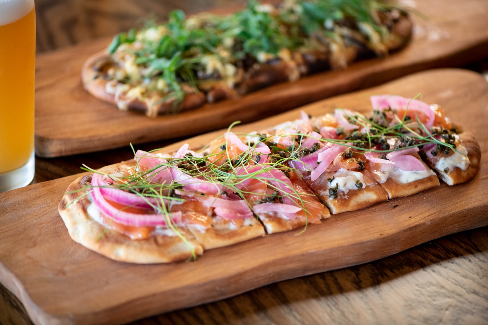 Bar (n) Booze (n) Bites Smoked Salmon Flat Bread with whipped fromage, lemon, crispy capers, and local herbs.  (Mia Yakel for The Atlanta Journal-Constitution)