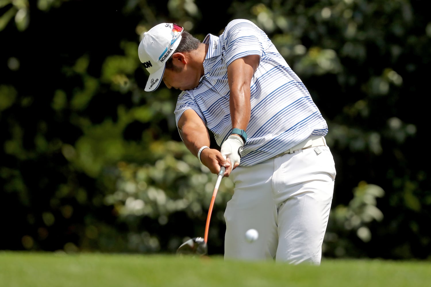 April 8, 2021, Augusta: Hideki Matsuyama hits his tee shot on the eleventh hole during the first round of the Masters at Augusta National Golf Club on Thursday, April 8, 2021, in Augusta. Curtis Compton/ccompton@ajc.com