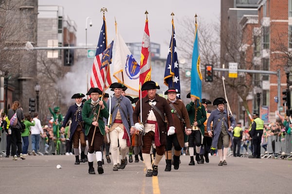 Participants dressed as Minutemen march during the St. Patrick's Day parade, Sunday, March 16, 2025, in Boston, Mass. (AP Photo/Robert F. Bukaty)