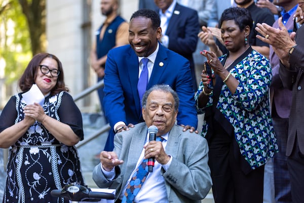 Atlanta Mayor Andre Dickens reacts as former Atlanta mayor Andrew Young speaks about the Atlanta Public Safety Training Center at a press conference in front of Atlanta City Hall on Wednesday, April 19, 2023. (Arvin Temkar / arvin.temkar@ajc.com)