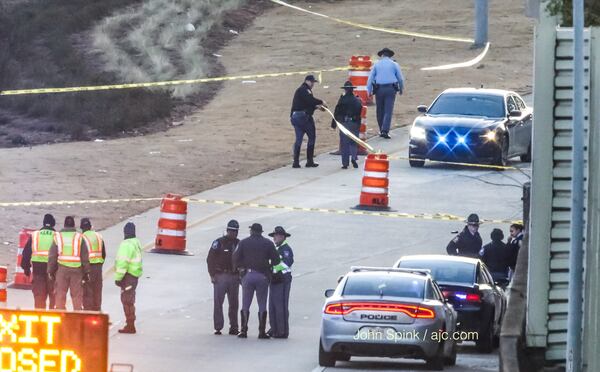 The exit ramp from I-20 East to Boulevard was blocked due to heavy police activity. JOHN SPINK / JSPINK@AJC.COM