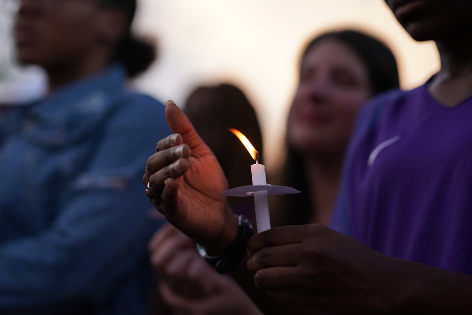 Friends and family of Imani Bell gathered for a candlelight vigil Wedneday, Aug. 21, 2019, at Dixon Grove Baptist Church in Jonesboro. The 16-year-old Clayton student died during outdoor athletic drills for Elite Scholars Academy. (Elijah Nouvelage for The Atlanta Journal-Constitution)