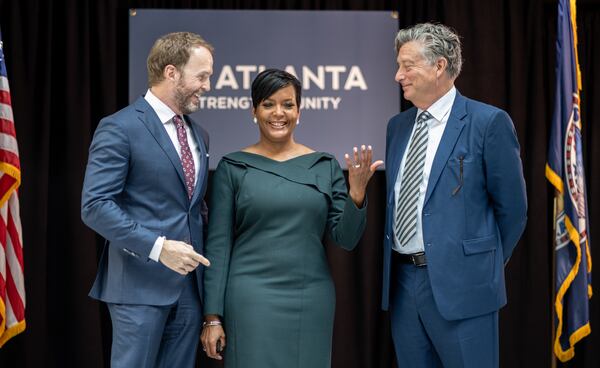 211014-Atlanta-Centennial Yards President Brian McGowan, Atlanta Mayor Keisha Lance Bottoms and 
Richard Ressler, co-founder and principal at CIM Group, are all smiles while waiting to take a photo following press conference to announce the finalization of a redevelopment agreement for Centennial Yards in downtown Atlanta on Thursday, Oct. 14, 2021. Ben Gray for the Atlanta Journal-Constitution