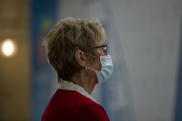 Dr. Kathy Toomey, Commissioner of the Georgia Department of Public Health, wears a face mask as she watches Gov. Brian Kemp make a statement during a COVID-19 update press conference at the Georgia State Capitol Building in Altanta, Thursday, May 28, 2020. ALYSSA POINTER / ALYSSA.POINTER@AJC.COM