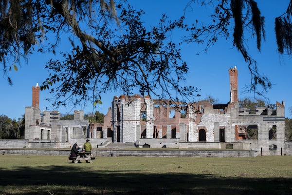 CUMBERLAND ISLAND, GA - DECEMBER, 26, 2022: A couple from Montana eat lunch near the ruins of Dungeness on the south end of the National Seashore, Monday, Dec. 26, 2022, in Cumberland Island, Georgia. (AJC Photo/Stephen B. Morton)