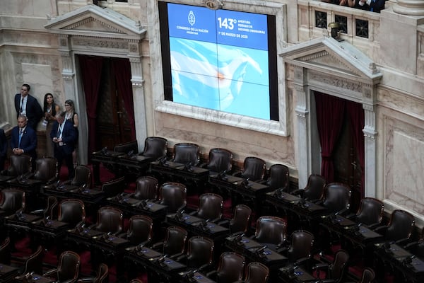 Seats belonging to opposition party Union por la Patria are seen empty as Argentina's President Javier Milei delivers the annual State of the Nation address in Buenos Aires, Argentina, Saturday, March 1, 2025. (AP Photo/Rodrigo Abd)