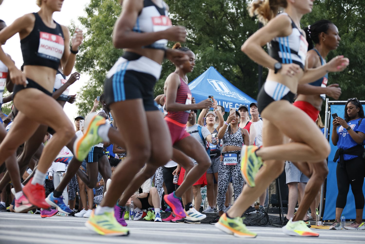 Runners in the 53rd running of the Atlanta Journal-Constitution Peachtree Road Race in Atlanta on Monday, July 4, 2022. (Miguel Martinez / Miguel.MartinezJimenez@ajc.com)