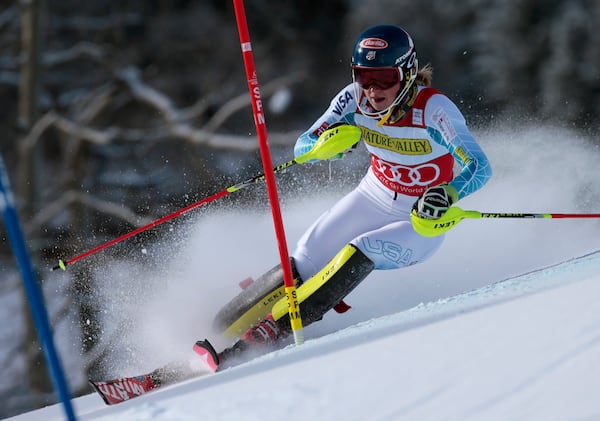 FILE - United States' Mikaela Shiffrin speeds down the course during the women's World Cup slalom ski race Saturday, Nov. 28, 2015, in Aspen, Colo. (AP Photo/Nathan Bilow, File)