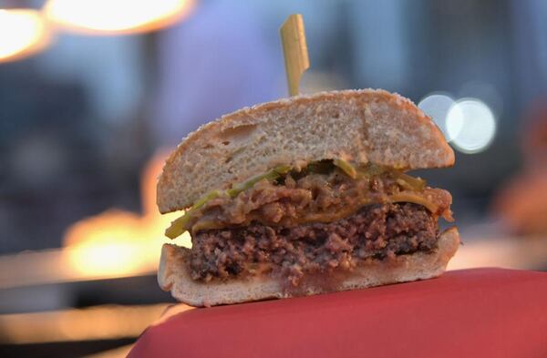 NEW YORK, NY - OCTOBER 13:  A burger from Burger and Barrel on display at the Food Network & Cooking Channel New York City Wine & Food Festival Presented By Coca-Cola -  (Photo by Mike Coppola/Getty Images for NYCWFF)