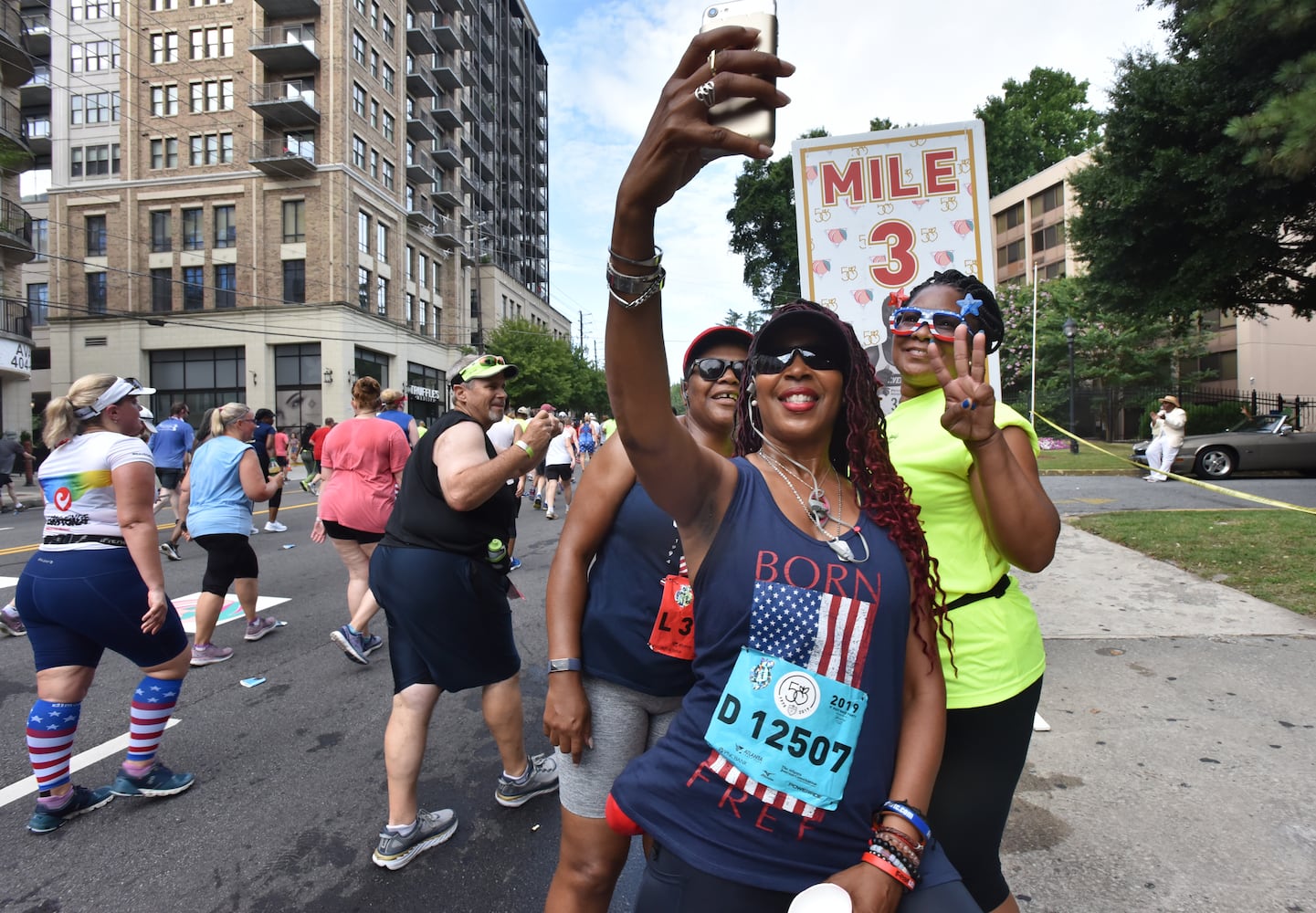 PHOTOS: Scenes at 2019 AJC Peachtree Road Race