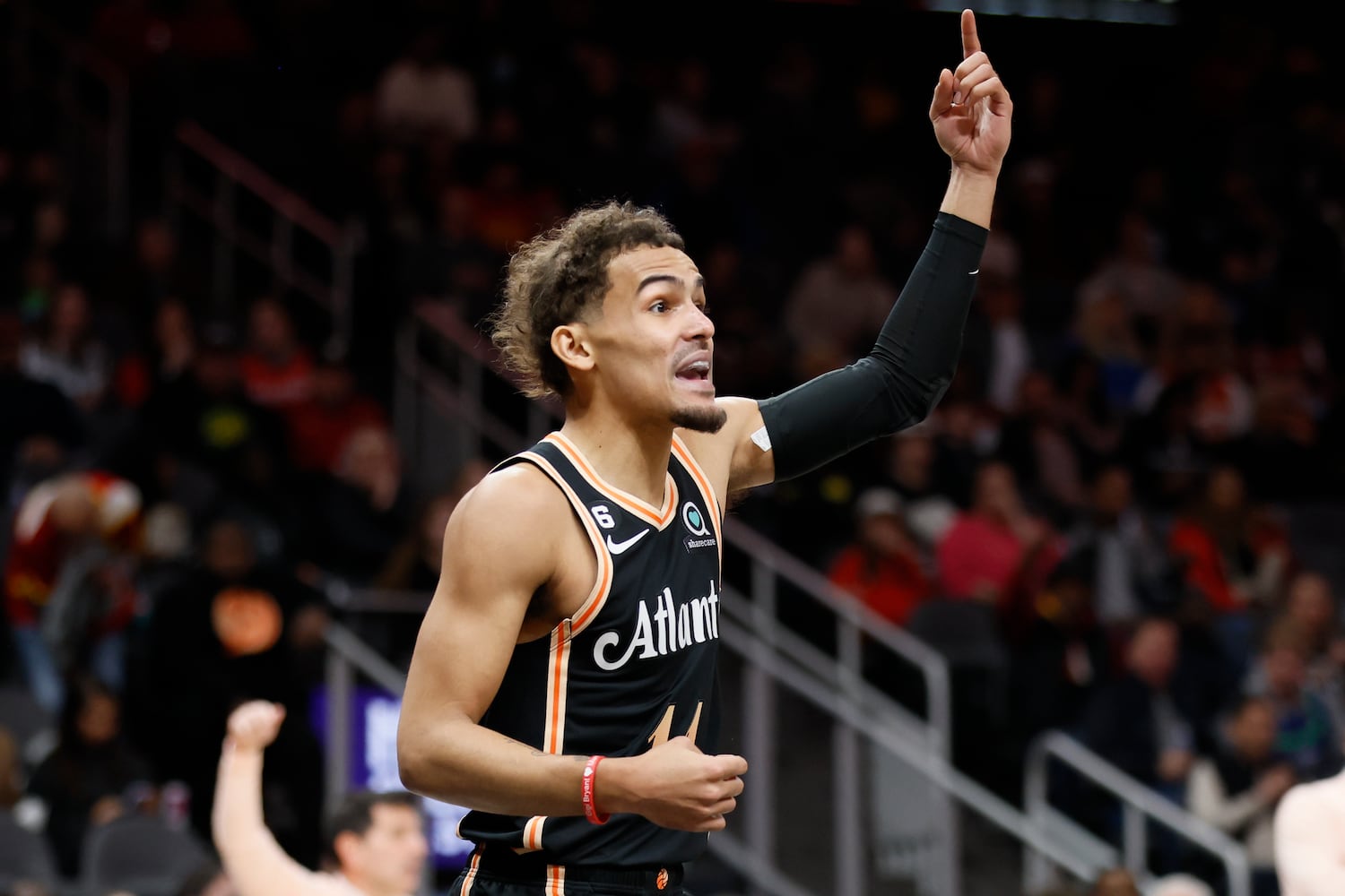 Hawks guard Trae Young calls a play during the first half against the Magic on Monday night in Atlanta. (Miguel Martinez / miguel.martinezjimenez@ajc.com)