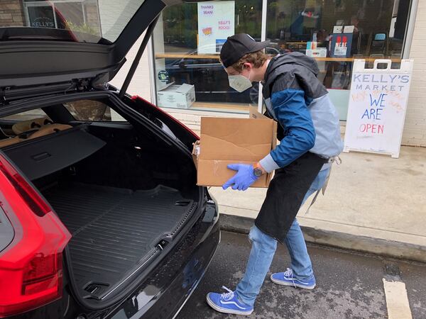 Tanner Crotty delivers groceries from the family business, Kelley’s Market, in Decatur, and finds that the customers are always glad to see him. “They’re jumping up and down,” he said, because sometimes it’s the only human interaction they’ve had in a week. CONTRIBUTED: SEAN CROTTY