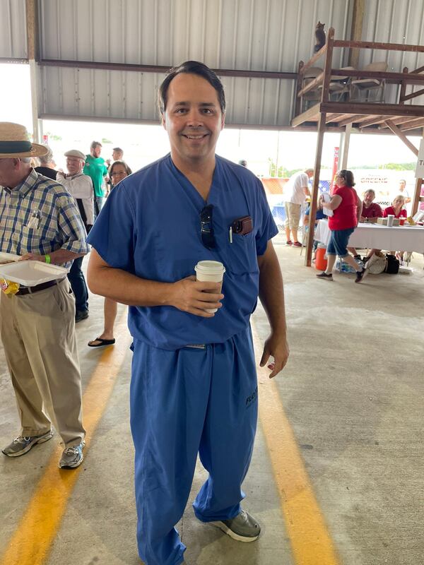 Dr. John Cowan, a Republican who ran unsuccessfully against Marjorie Taylor Greene, tried to get some fellow conservatives to get vaccinated at a rally in Rome. Photo by Greg Bluestein