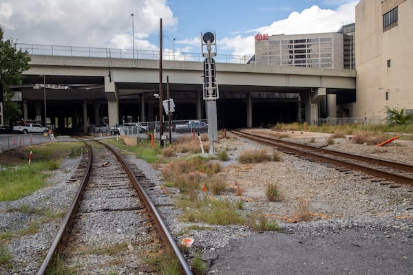 The Gulch is a 40-acre hole in downtown Atlanta where trains run, homeless people sleep and Falcons fans party.