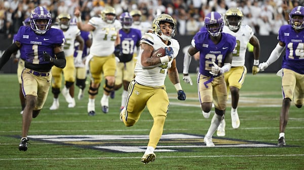 Dontae Smith outruns defenders on his way to the end zone for Georgia Tech in its home game against Western Carolina during the 2022 season.