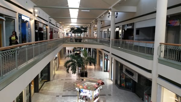 Shoppers and retailers are in short supply at Gwinnett Place mall in Duluth. Once a center of commerce, the mall has struggled and plans for a major redevelopment have yet to be finalized. MATT KEMPNER / AJC