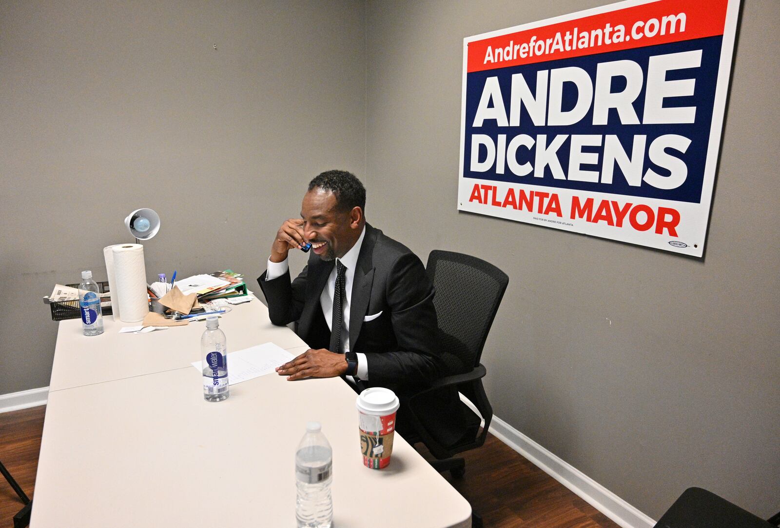 December 1, 2021 Atlanta - Mayor-elect Andre Dickens talks on the phone at his campaign headquarters on Wednesday, December 1, 2021. Andre Dickens, the Atlanta native who first beat an incumbent eight years ago for a spot on the City Council, defeated Felicia Moore in Tuesday's runoff election to become Atlanta's 61st mayor. (Hyosub Shin / Hyosub.Shin@ajc.com)