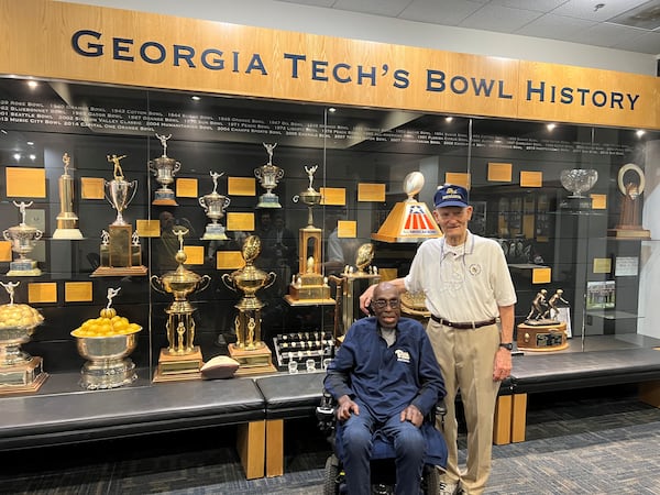 Bobby Grier (seated) and Wade Mitchell visited in the Georgia Tech athletic building when Grier took a tour of the Tech campus in June. Grier played football at the University of Pittsburgh and Mitchell at Tech. Their teams met in the 1956 Sugar Bowl, a game known as a significant one in the history of segregation in the South. Grier played fullback for Pitt, and Mitchell was Tech's quarterback. (Photo courtesy of Wright Mitchell)