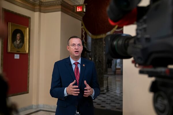 Rep. Doug Collins, R-Georgia, the top Republican on the House Judiciary Committee, does a tv news interview just outside the House chamber, Friday, Jan. 10, 2020, at the Capitol in Washington. Speaker of the House Nancy Pelosi, D-Calif., has not yet relayed the articles of impeachment to the Senate for trial three weeks since President Donald Trump was impeached on charges of abuse and obstruction. (AP Photo/J. Scott Applewhite)