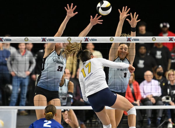 Atlanta Vibe Grace Cleveland (20) and Atlanta Vibe Shelly Fanning (3) blocked a spike by the San Diego Mojo during Atlanta Vibe’s first home opener in a Pro Volleyball Federation game at Duluth's Gas South Arena in February 2024. (Hyosub Shin / Hyosub.Shin@ajc.com)