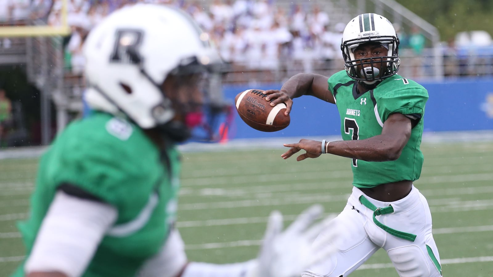 Roswell High School quarterback Malik Willis (7) looks to pass against Buford High School during the Corky Kell Classic at McEachern High School, Friday, Aug. 19, 2016, in Powder Springs. (Brandel Camp/Special to AJC)