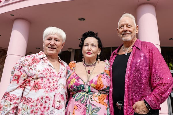 (Left to right) Three-13 Salon, Spa & Boutique partners Tony Lacey, Marian Crowell and Lester Crowell Jr. pose for a photo in front of the salon on Wednesday, March 13, 2024. (Natrice Miller/ Natrice.miller@ajc.com)