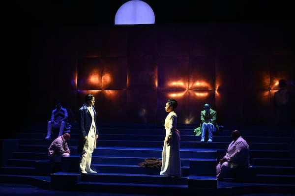 Cast members in “A Tale of Two Cities” each enjoy a moment in the spotlight, their presence raised by Jiyoun Chang's evocative scenic and lighting design.