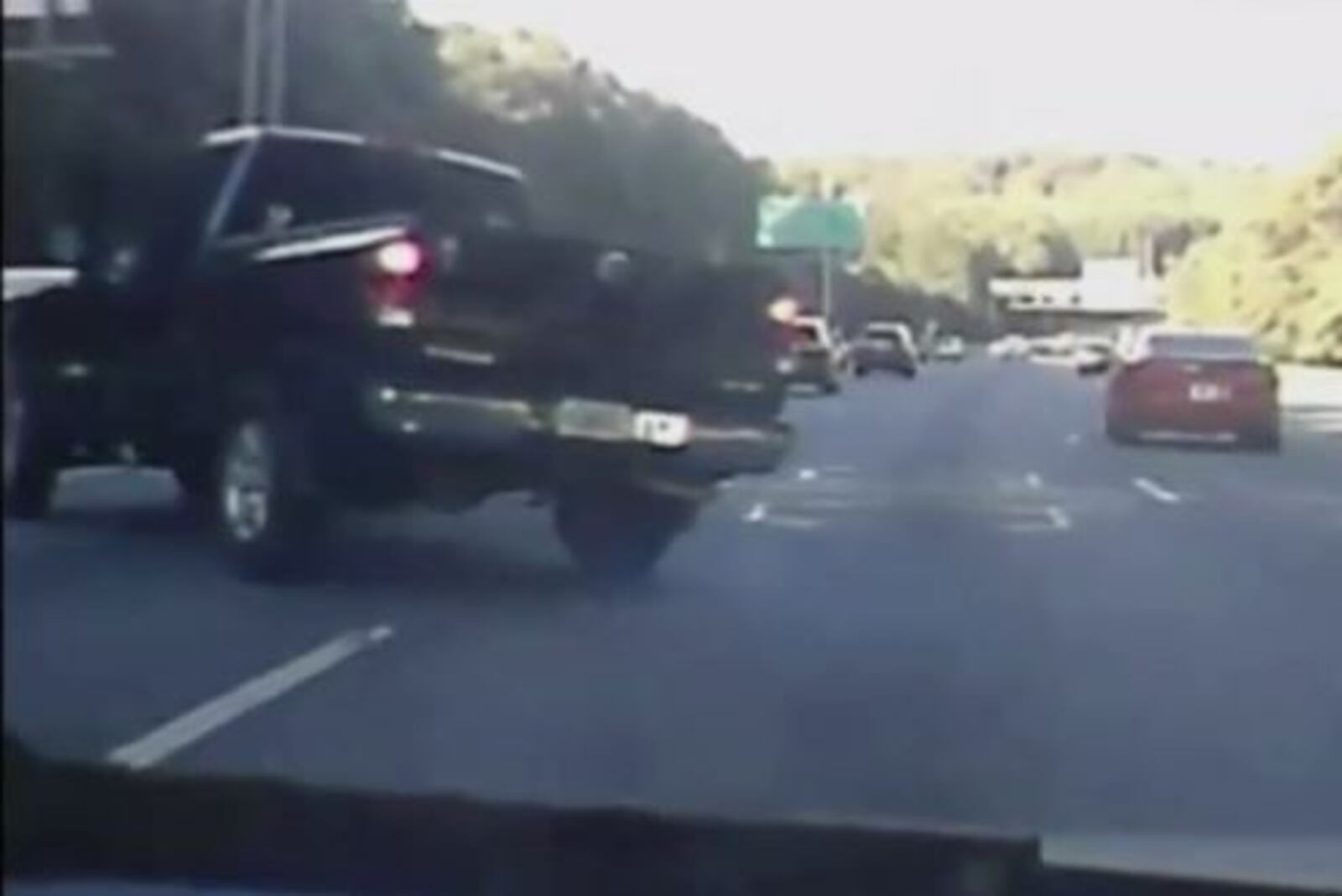 A screenshot of a driver's dashcam footage of the August wreck that killed Forrest Kelly, 61, of Gwinnett County on U.S. 78 in DeKalb County.