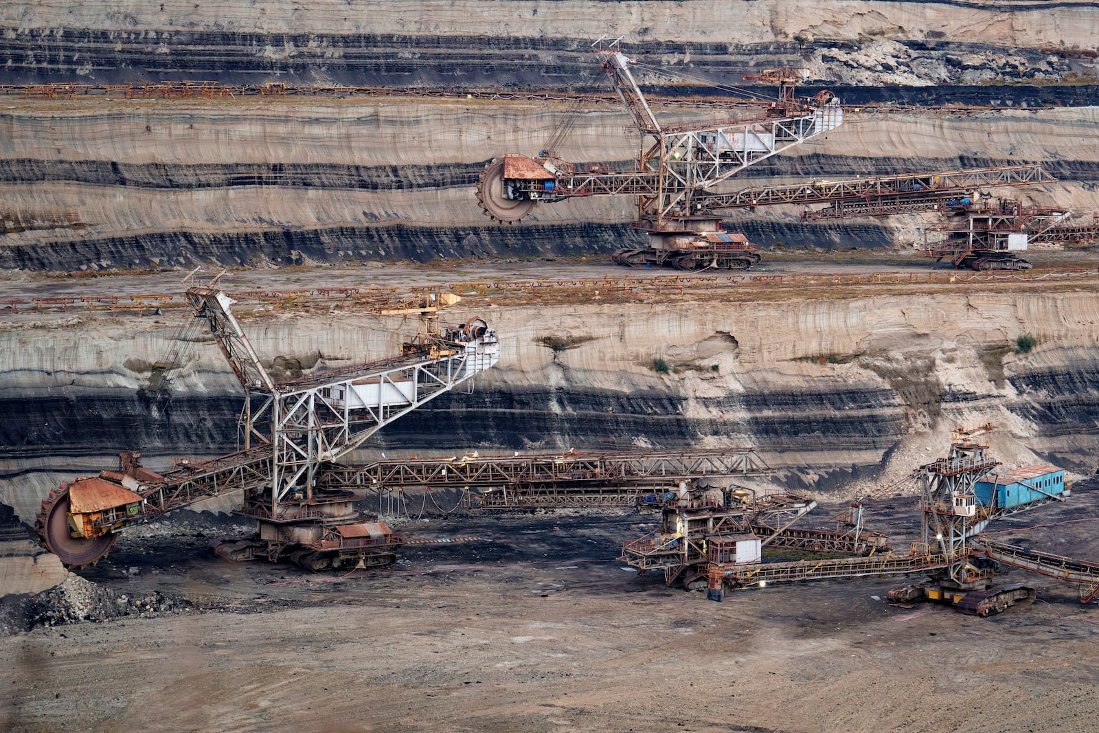 Coal extraction equipment operates at the open air quarry outside Matasari, southern Romania, Friday, Oct. 11, 2024. (AP Photo/Vadim Ghirda)