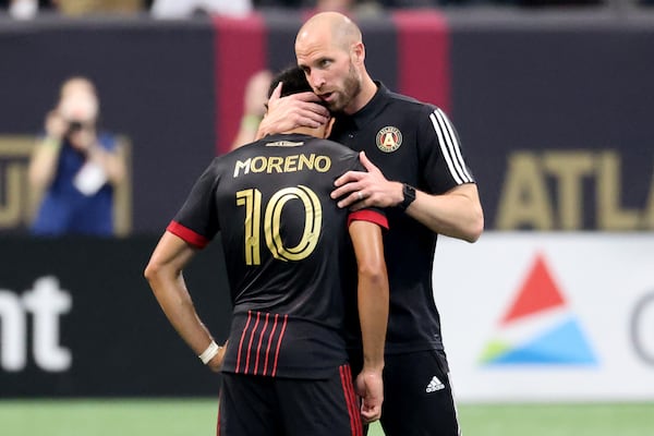 Atlanta United interim coach Rob Valentino consoles midfielder Marcelino Moreno (10) after their 1-0 loss to the Columbus Crew Saturday, July 24, 2021, at Mercedes Benz Stadium in Atlanta. (Jason Getz/For the AJC)

