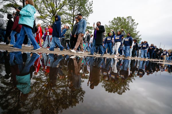 Participants walk towards the Edmund Pettus Bridge during a commemoration of the 60th anniversary of Bloody Sunday on Sunday, March 9, 2025, in Selma, Alabama. (Miguel Martinez/ AJC)