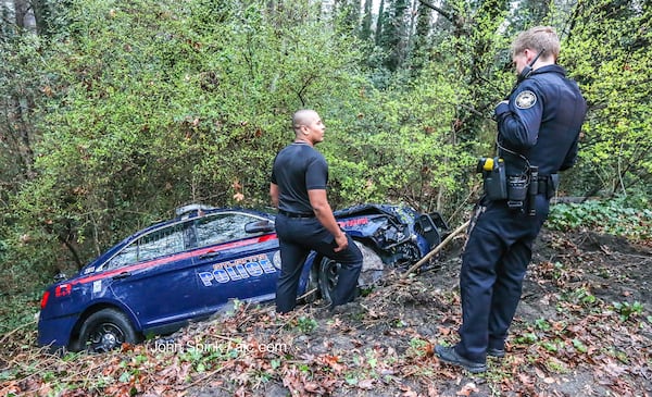 The unidentified officer was taken to Grady Memorial Hospital in stable condition with head and back pain, Atlanta police Officer Donald Hannah said. He later returned to the scene to gather his things. JOHN SPINK / JSPINK@AJC.COM