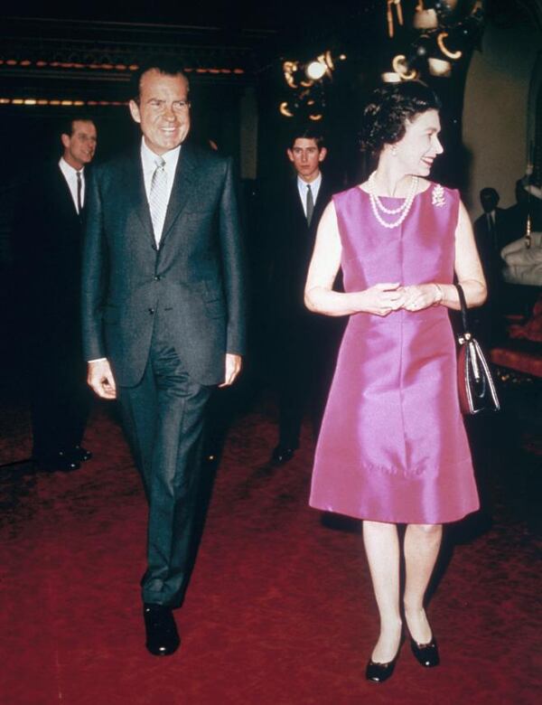 Queen Elizabeth II with U.S President Richard Nixon (1913 - 1994) followed by Princes Philip and Charles, 1969. (Photo by Hulton Archive/Getty Images)