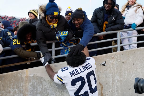 Michigan running back Kalel Mullings celebrates the team's win over Ohio State in an NCAA college football game Saturday, Nov. 30, 2024, in Columbus, Ohio. (AP Photo/Jay LaPrete)