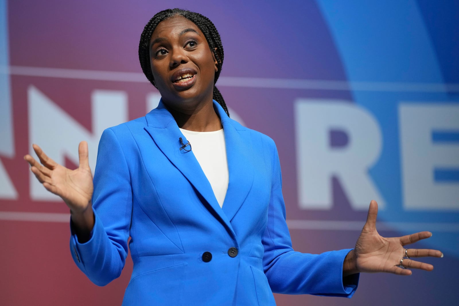 FILE - Conservative leadership candidate Kemi Badenoch addresses members during the Conservative Party Conference at the International Convention Centre in Birmingham, England, Wednesday, Oct. 2, 2024. (AP Photo/Kin Cheung, File)