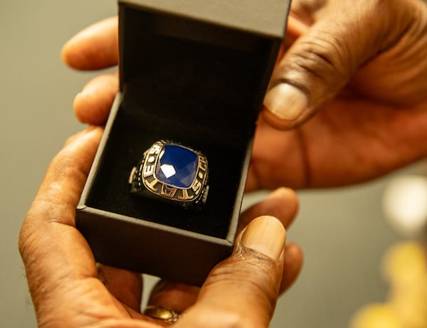 The Bailey-Johnson High School's basketball team of 1964-65 receive their State Championship rings on Monday during the Alpharetta City Council meeting.  (Jenni Girtman for The Atlanta Journal-Constitution)