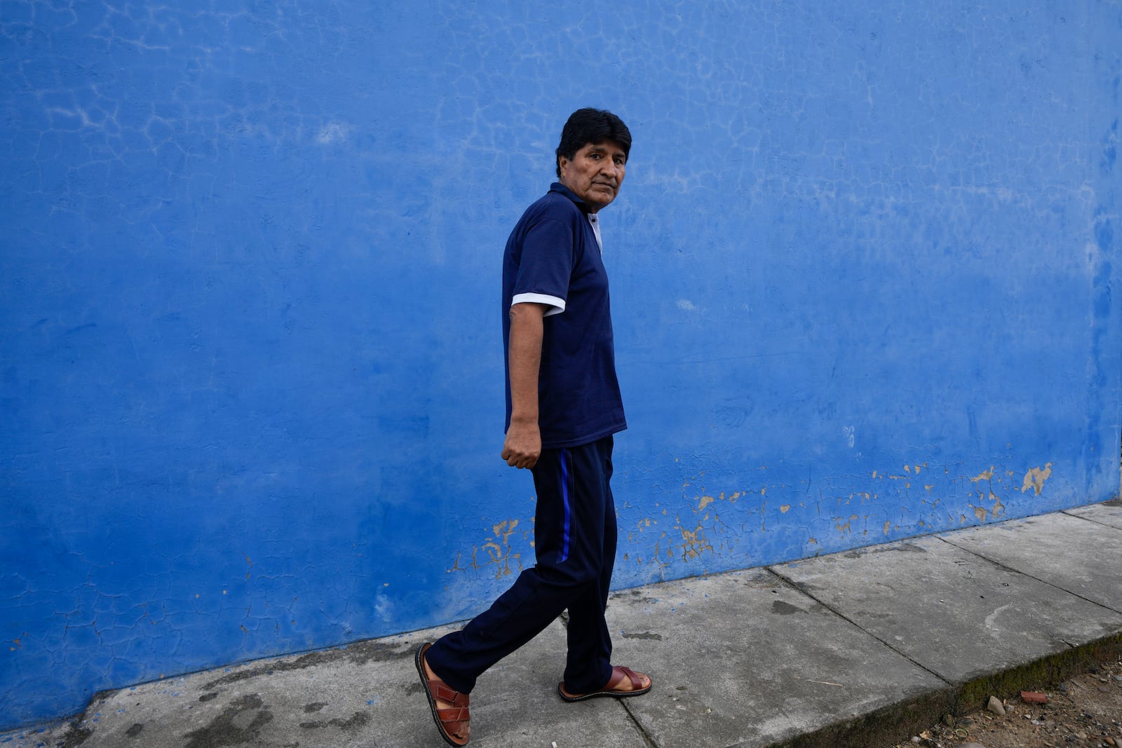 Former President Evo Morales walks in Lauca N, Chapare region, Bolivia, Sunday, Nov. 3, 2024, amid an ongoing political conflict with the government of President Luis Arce. (AP Photo/Juan Karita)