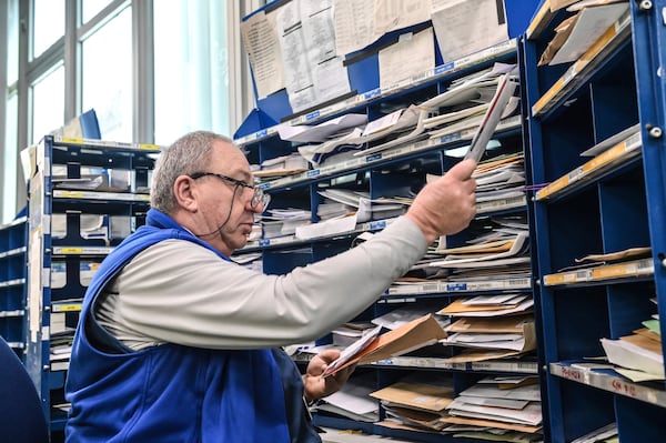 Letters addressed to Pope Francis are sorted at Leonardo da Vinci International Airport's postal sorting center in Fiumicino some 30 kilometers south-west of Rome, Wednesday, March 19, 2025. (AP Photo/Chris Warde-Jones)