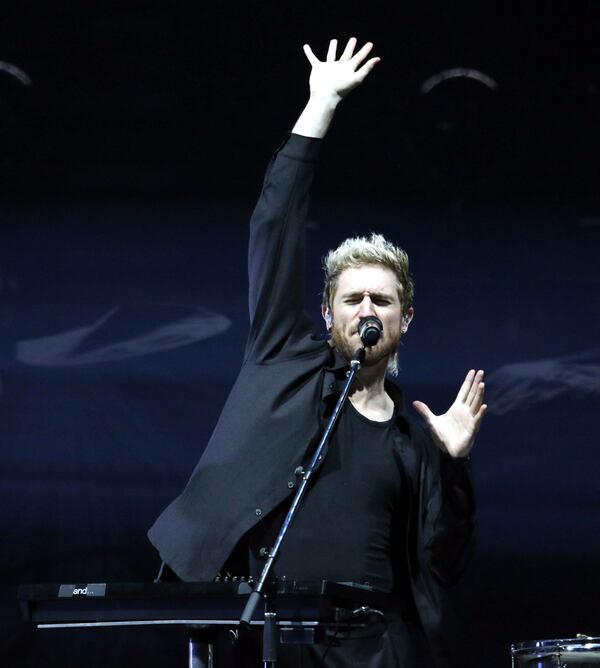 Walk the Moon singer/keyboardist Nicholas Petricca engages the crowd at State Farm Arena.