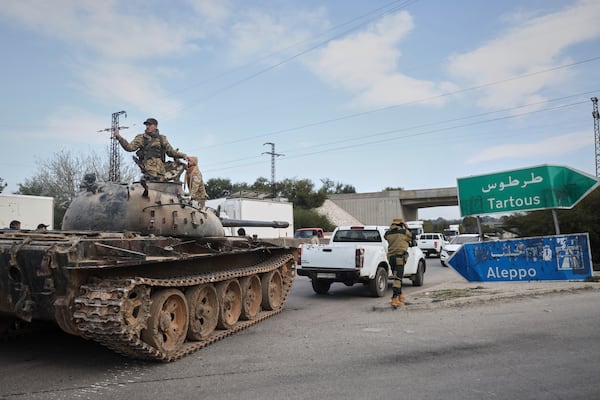 Reinforcement Syrian security forces deploy in the outskirts of Latakia, Syria, Friday, March 7, 2025. (AP Photo/Omar Albam)