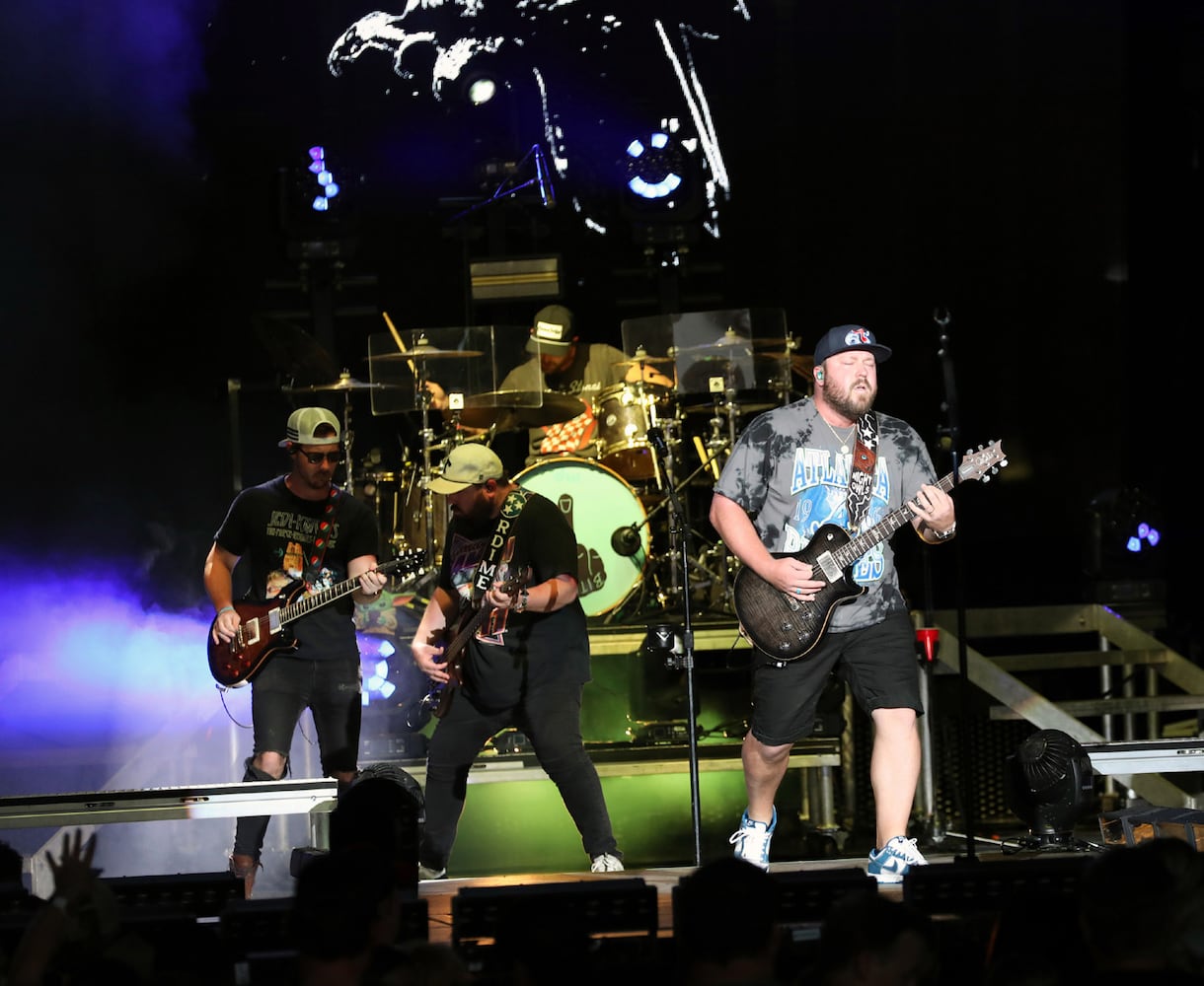 Mitchell Tenpenny performs as one of the opening acts when chart-topping Jason Aldean made a tour stop at Atlanta's Lakewood Amphitheatre on Saturday, August 5, 2023. (Photo: Robb Cohen for The Atlanta Journal-Constitution)