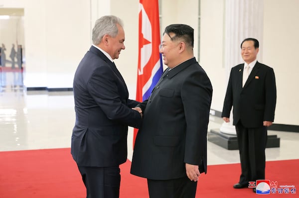 In this this photo provided by the North Korean government, Russia's Security Council Secretary, Sergey Shoigu, left, and North Korean leader Kim Jong Un shake hands during their meeting in Pyongyang, North Korea Friday, March 21, 2025. Independent journalists were not given access to cover the event depicted in this image distributed by the North Korean government. The content of this image is as provided and cannot be independently verified. Korean language watermark on image as provided by source reads: "KCNA" which is the abbreviation for Korean Central News Agency. (Korean Central News Agency/Korea News Service via AP)