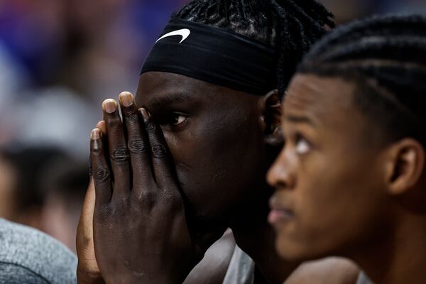 Georgia center Somto Cyril, left, sits on the bench during the second half of an NCAA college basketball game against Oklahomaat the Southeastern Conference tournament, Wednesday, March 12, 2025, in Nashville, Tenn. (AP Photo/Wade Payne)