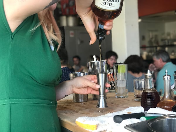 Four cocktails are prepared tableside at Gunshow in Glenwood Park. / Courtesy of Gunshow