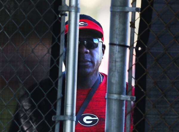 As the director of player support for the University of Georgia's football team, Bryant Gantt regularly schedules players’ court dates, negotiates plea deals and delivers cash to the courthouse to pay their fines. He also accompanies players to the police station for questioning, both as witnesses to crimes and as suspects. “Curtis Compton / Curtis.Compton@ajc.com”`