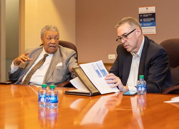 Fulton County Commissioner Robb Pitts, from left, calls a meeting with Grady Hospital executives, including John Haupert, Grady Health System President and CEO; as well as Fulton-DeKalb Hospital Authority board members and other commissioners Tuesday, April 12, 2022 to discuss the upcoming closure of Wellstar Atlanta Medical Center South, the only hospital in the metro area south of I-20.  (Jenni Girtman for The Atlanta Journal-Constitution)