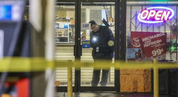 Police investigate a shooting in Atlanta in November. (AJC photo)